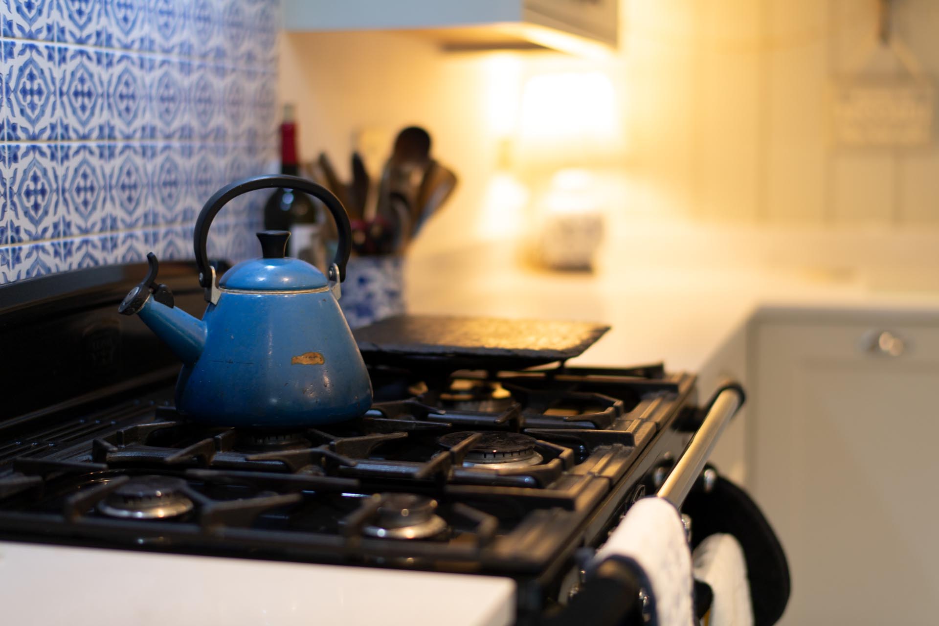 Blue enamelled kettle and range
