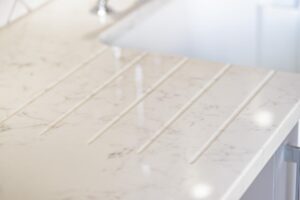 changes in quartz worktops Norden Kitchens Affordable Granite Radianz Lucern Lake drainer grooves