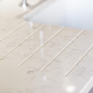 Norden Kitchens Affordable Granite Radianz Lucern Lake 210409 145540 b a changes in quartz worktops Norden Kitchens Affordable Granite Radianz Lucern Lake drainer grooves