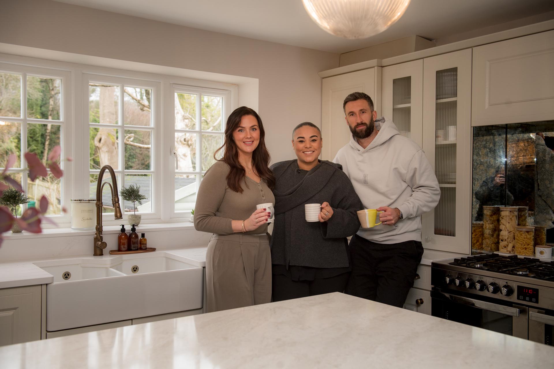 Ollie & Caitlin Palmer with Cassie of Affordable Granite