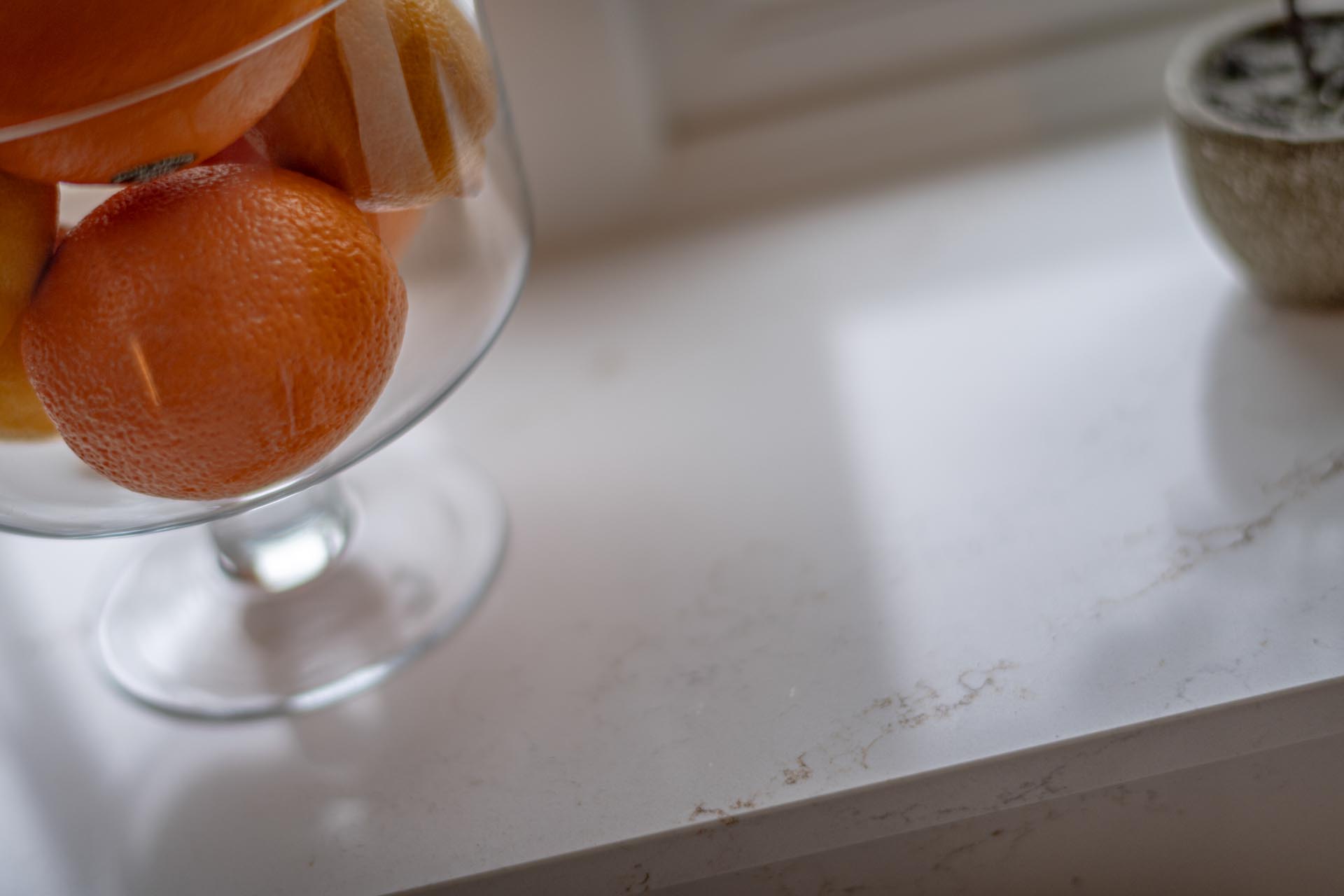 Palmer Strawhill Kits Silestone Ethereal Glow Unistone Taj Mahal quartz worktops surrey kingswood tadworth oranges on silestone quartz worktops