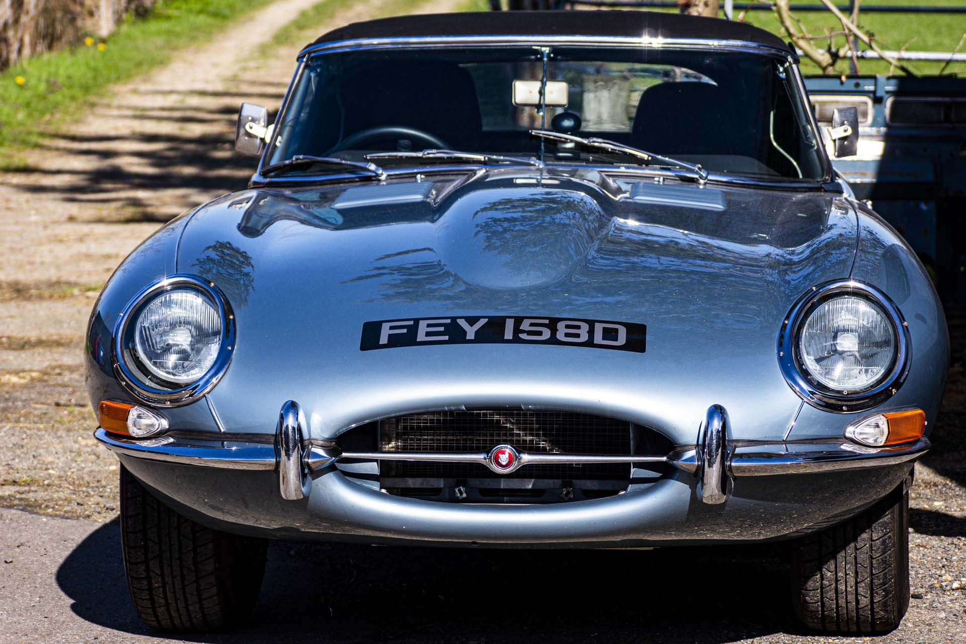 cars at RACE - and this silver e-type