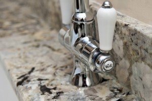 arctic-cream-granite-oxted-124100-a-detail-tap-min