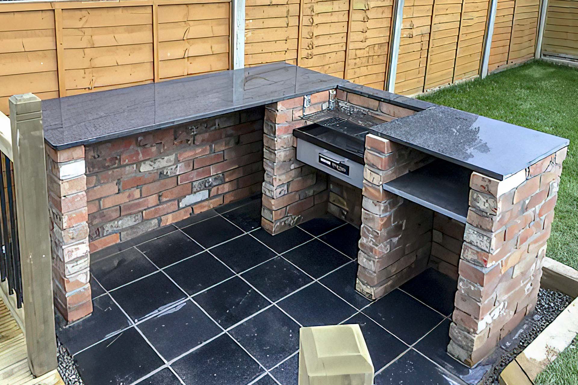 black knight barbecue with grey granite worktops a