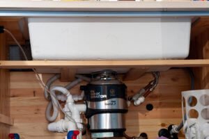 cimstone_oasis_quartz_horsham_farmhouse_085607_a_waste-disposal_unit_insinkerator_mounting_cradle_detail-red