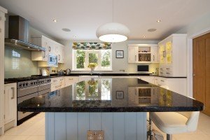 steel-grey-granite-kitchen islands cuckfield-west-sussex-yew-tree-kitchens-110302a-island-min